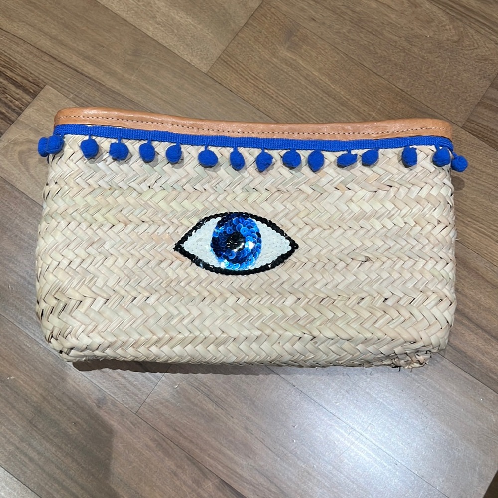 Brand new rattan evil eye clutch from bits and pieces to go